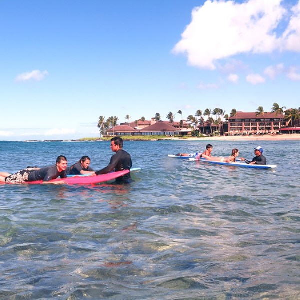 group surf lesson in kauai